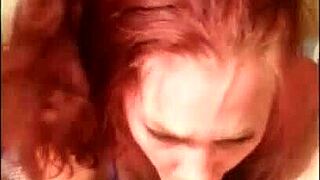 Redhead milf amateur enjoys double penetration in homemade threesome