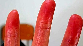 wet asian japanese female hands in a fetish setting