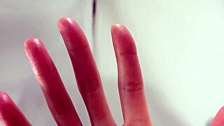 wet asian japanese female hands in a fetish setting