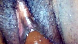 A black woman that likes fisting with a black fist