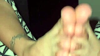 She masturbates me with feet until I cum