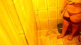A porn star in quarantine diary scene with a sexy bathroom scene