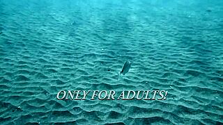 Sexy women swimming in the open sea off Tenerife