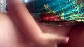 She's fingering her shaved pussy in public