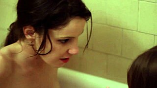 Lesbians Rilee and Alice Tease in Hotel Bathtub