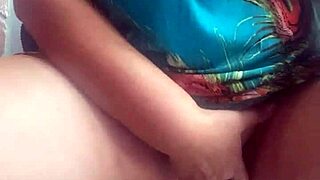 She's fingering her shaved pussy in public