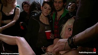 Hardcore BDSM at crowded bar among Ebony exhibitionists