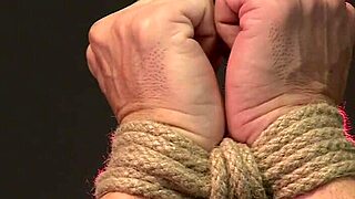 bdsm xxx slave boy in metal stocks as he receives anal attention