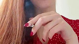 Alice with red hair smoking