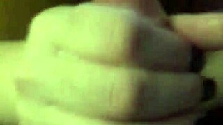 redhead amateur subtly licks and sucks balls with handjob tease.