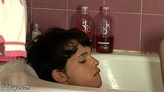 Nude Gay Twink Boy Having Fun Stroking His Cock In A Bubble Bath.