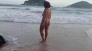 Wife sucks big black cock on beach rocks