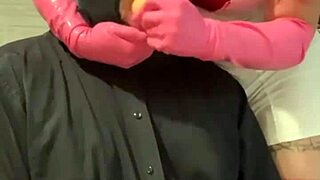 This patient is dominated by dominant submissive in red latex