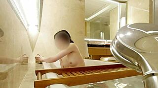 Clear Teaching Assistant Bathes and Showers in Luxury Hotel