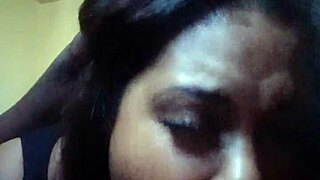 A massive black cock is being serviced by Sexy Miss Mazi