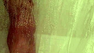 The Brunette wife masturbates in the shower