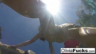 Olivia Enjoys Naughty Summer Fun by the Pool with Her Big Tits