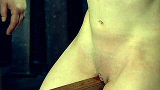 This brunette slave endures whipping and deepthroat choking