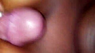 amateur titfuck and cumshot in interracial blowjob action