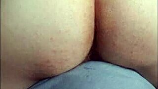 boy putinha plays with shampoo bottle