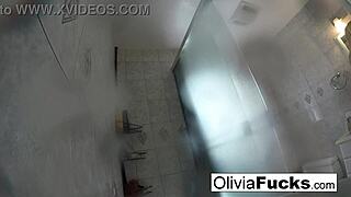 Pierced Olivia relaxes in nude shower after long day
