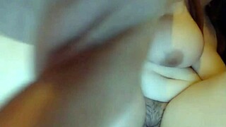 Redhead Slut Plays with Big Tits in Room