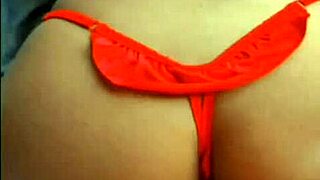 Hottie in red lingerie giving hot oral