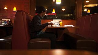 i see indian guy enjoying american breakfast outdoors