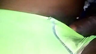 Housewife pulls pants aside on bed