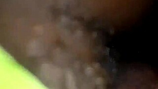 Housewife pulls pants aside on bed