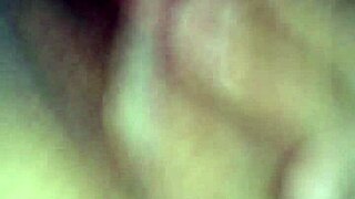 American woman playing with dildo toys