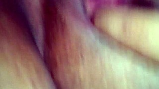 American woman playing with dildo toys