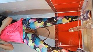 Intense close up dildo masturbation in gym shower with pee