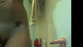 A beautiful teen with a nude slim body type has fun while masturbating with a fake vagina