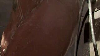 Amateur friend assists wet and naked big boobed gal in the shower