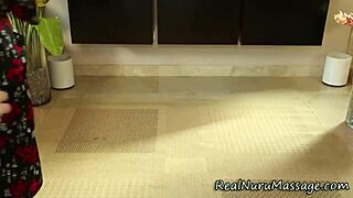 Asian masseuse gets intensely fingered during nuru massage