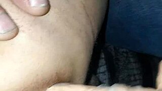 A wife using a large sex toy to pleasure her husband’s anus