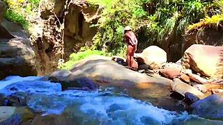 lilyan playing with toys on riverbank