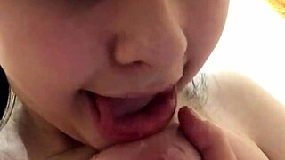 Solocam show of young brunette enjoying self-pleasure by licking and spitting on her own nipple