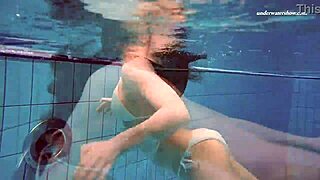Watch Russian teen Alla swim naked, showing big tits and juicy ass.