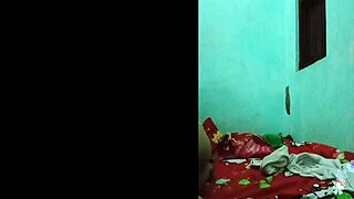 This horny Asian babe pleases herself on the bed