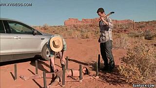 Bound slut gets anal pounded in a desert scene.