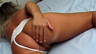 blonde milf masturbates with fake dick but he fingers her bound