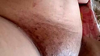 Hot young teen masturbates to orgasm, showing her small tits in solo amateur video part two.