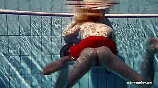 That is Leonid Denesyuk and young Russian girl Lucie swimming in the pool