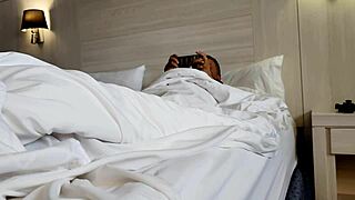 Beautiful couple rides to orgasm in bedroom