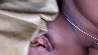 Ebony bonnet sucks monster cock at work