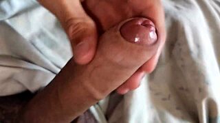 beautiful redhead giving handjob to big cock