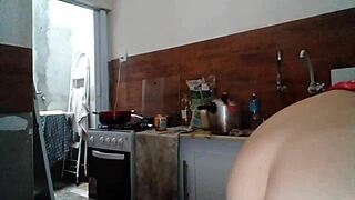 Stella in the morning in the room and kitchen cooking