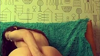 beautiful brunette plays with her anal toys